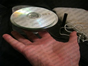 Balancing used CDs on one finger to gain a world record