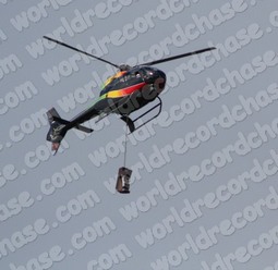 Dropping a gambling machine from a helicopter