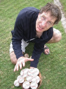 Holding 14 baseballs in one mitt / glove to set a new world record