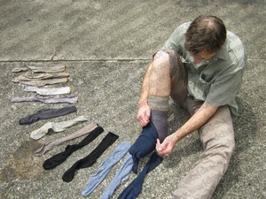 Practising putting on socks for a world record