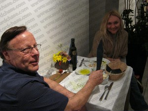 David Adamovich (The Great Throwdini) with his 'target' - selection of throwing knives on table